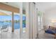 Relax on the private balcony with water views, accessible from the main bedroom and living area at 225 Sands Point Rd # 6204, Longboat Key, FL 34228