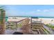 Picturesque boardwalk leads to a sunny beach with turquoise waters at 225 Sands Point Rd # 6204, Longboat Key, FL 34228