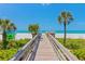 Charming boardwalk to pristine beach with clear, inviting waters at 225 Sands Point Rd # 6204, Longboat Key, FL 34228