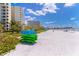 Scenic beach view showcasing turquoise waters and recreational beach equipment at 225 Sands Point Rd # 6204, Longboat Key, FL 34228