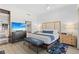 Comfortable bedroom with a king-size bed and a view of the outside at 225 Sands Point Rd # 6204, Longboat Key, FL 34228