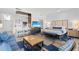 Modern living room and kitchenette with stylish furnishings and natural light at 225 Sands Point Rd # 6204, Longboat Key, FL 34228
