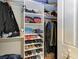Walk in closet with shelving for clothes, shoes and personal items at 2622 Light Sky Ln, Bradenton, FL 34211