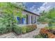 Exterior view of the clubhouse with lush landscaping and inviting entrance at 2622 Light Sky Ln, Bradenton, FL 34211