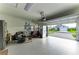 Spacious two car garage with finished epoxy floor, block walls and house access at 2622 Light Sky Ln, Bradenton, FL 34211