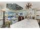 Open floor plan view of the living room with access to kitchen, vaulted ceilings, recessed lights, and glass doors at 2622 Light Sky Ln, Bradenton, FL 34211