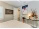Light filled main bedroom with contemporary decor and an ensuite doorway at 2622 Light Sky Ln, Bradenton, FL 34211