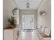 Welcoming foyer with neutral tones, decorative lighting, and stylish accents at 27350 San Carlos Dr, Punta Gorda, FL 33983