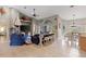 Bright and airy living room featuring an open layout and seamless flow to dining area at 27350 San Carlos Dr, Punta Gorda, FL 33983