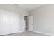 The bedroom has hardwood floors with minimalist design and an open doorway at 3166 Cabo St, North Port, FL 34291