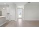 Bright entryway with tile flooring, white walls, and a view of the front door at 3166 Cabo St, North Port, FL 34291