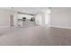 Open concept living space with tile floors, neutral walls, and a view of the kitchen at 3166 Cabo St, North Port, FL 34291