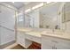 Spacious bathroom with shower, vanity, and ample counter space at 3872 Mira Lago Dr, Sarasota, FL 34238