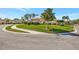 Charming single-Gathering home featuring a circular driveway and lush greenery at 3872 Mira Lago Dr, Sarasota, FL 34238
