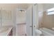 Bathroom with a vanity sink, toilet, and a shower-tub combination, accessible from the bedroom at 4307 70Th E Ave, Ellenton, FL 34222