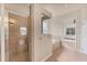 Modern bathroom with a glass-enclosed shower and soaking tub at 4307 70Th E Ave, Ellenton, FL 34222