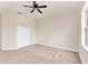 Bedroom features carpet, closet, ceiling fan and large window to let in plenty of natural light at 4307 70Th E Ave, Ellenton, FL 34222