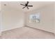 Spacious bedroom with neutral carpet, ceiling fan, and a window providing natural light at 4307 70Th E Ave, Ellenton, FL 34222