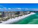 Luxury beachfront condos boast clear turquoise waters and a pristine white sand beach at 435 L Ambiance Dr # L807, Longboat Key, FL 34228