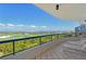 Relax on this spacious balcony with views of the golf course, ocean, and the intercoastal waterway at 435 L Ambiance Dr # L807, Longboat Key, FL 34228