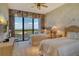 Bright bedroom with two twin beds, floor to ceiling windows, and a beautiful view of the gulf at 435 L Ambiance Dr # L807, Longboat Key, FL 34228