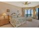A spacious main bedroom, featuring a king bed and serene ocean views at 435 L Ambiance Dr # L807, Longboat Key, FL 34228