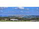 Beautiful city view of waterfront buildings and landscaped green spaces in a luxurious community at 435 L Ambiance Dr # L807, Longboat Key, FL 34228