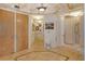 Bright foyer features elegant marble floors and detailed millwork, leading into the home at 435 L Ambiance Dr # L807, Longboat Key, FL 34228