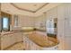 Modern kitchen with stainless steel appliances, granite countertops, and plenty of cabinet space at 435 L Ambiance Dr # L807, Longboat Key, FL 34228