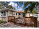 Exterior view of the house with deck and brick patio at 445 88Th N Ave, St Petersburg, FL 33702