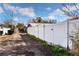 Property includes a tall white privacy fence at 445 88Th N Ave, St Petersburg, FL 33702
