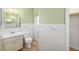 Updated bathroom with a tiled shower, and a modern sink and vanity at 4808 29Th W Ave, Bradenton, FL 34209