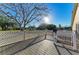 Spacious wooden deck with white lattice railing offers an inviting outdoor living space at 4920 82Nd E Pl, Sarasota, FL 34243
