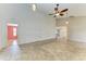 Expansive living area featuring high ceilings, tile floors, and neutral paint at 4920 82Nd E Pl, Sarasota, FL 34243