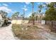 Backyard with fire pit and storage shed at 5107 Saint Albans Ave, Sarasota, FL 34242