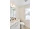 Neutral half bath with single sink vanity, modern faucet, and large window at 5107 Saint Albans Ave, Sarasota, FL 34242