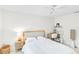 Bright bedroom featuring a ceiling fan, work station, and nightstand at 5107 Saint Albans Ave, Sarasota, FL 34242
