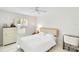 Bright bedroom featuring a ceiling fan, work station, and large window at 5107 Saint Albans Ave, Sarasota, FL 34242