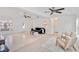 Spacious living room with modern lighting, ceiling fans, and stylish decor at 5107 Saint Albans Ave, Sarasota, FL 34242