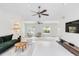 Open living space with pool view, comfortable seating, and modern design at 5107 Saint Albans Ave, Sarasota, FL 34242