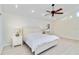 Light-filled main bedroom with neutral tones, ceiling fan, and ample natural light at 5107 Saint Albans Ave, Sarasota, FL 34242