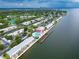 Aerial view of coastal property with community pool and waterfront access at 5282 Beach Se Dr # D, St Petersburg, FL 33705
