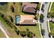 Aerial view of home with pool and patio at 5639 Rain Lily Ct, Sarasota, FL 34238