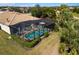 Aerial view of the house, highlighting the pool and backyard at 5639 Rain Lily Ct, Sarasota, FL 34238