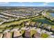 Aerial view of homes and surrounding area at 5639 Rain Lily Ct, Sarasota, FL 34238