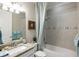 Bathroom with shower/tub combo and granite countertop at 5639 Rain Lily Ct, Sarasota, FL 34238