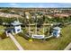 Hammock Preserve community entrance with palm trees and landscaping at 5639 Rain Lily Ct, Sarasota, FL 34238