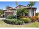 Single-Gathering home with two-car garage and lush landscaping at 5639 Rain Lily Ct, Sarasota, FL 34238