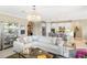 Living room with open concept to kitchen at 5639 Rain Lily Ct, Sarasota, FL 34238