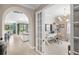 Bright home office with built-in desk and bookshelves at 5639 Rain Lily Ct, Sarasota, FL 34238